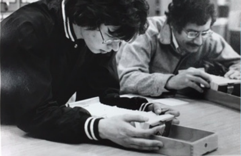 Students using the Engineering Library card catalog, 1977